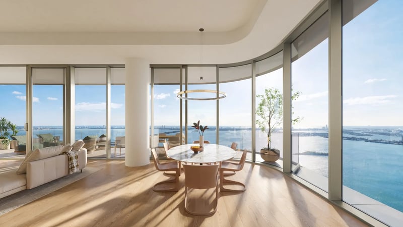 LILLI Miami Edgewater residence living room with floor-to-ceiling glass and Biscayne Bay views