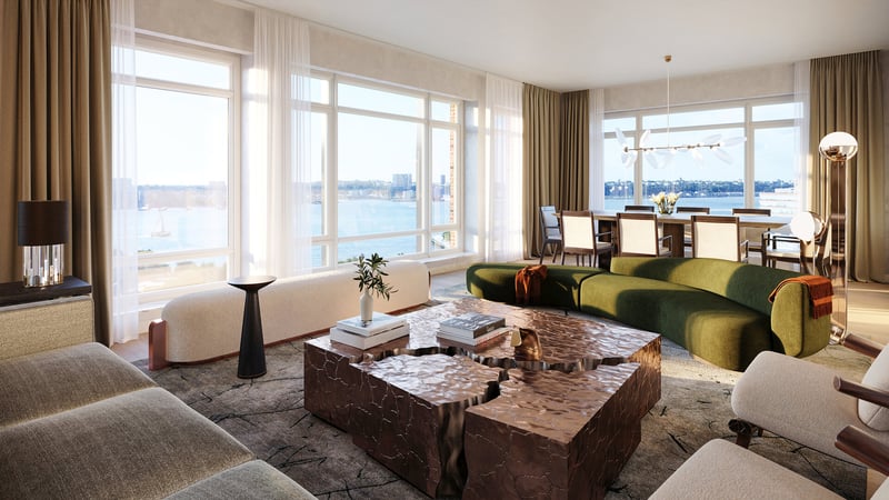 The Cortland living room with panoramic Hudson River sunset views